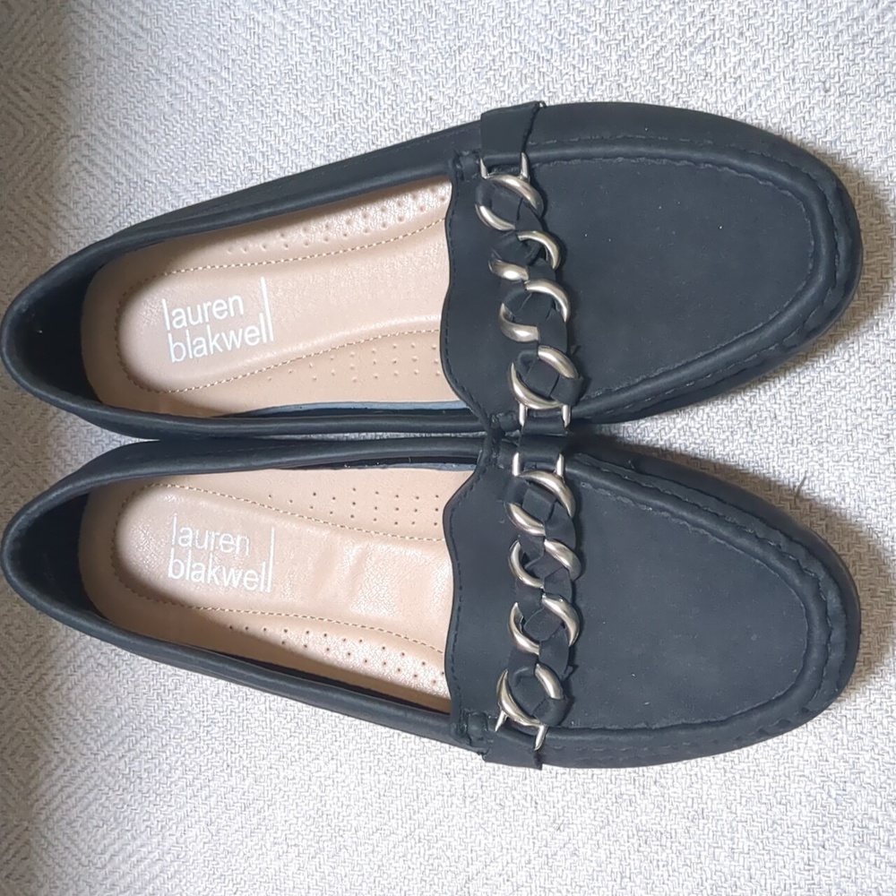Black loafers with silver chain
